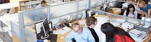 Crowded employee office with lots of acoustic and sound interference.